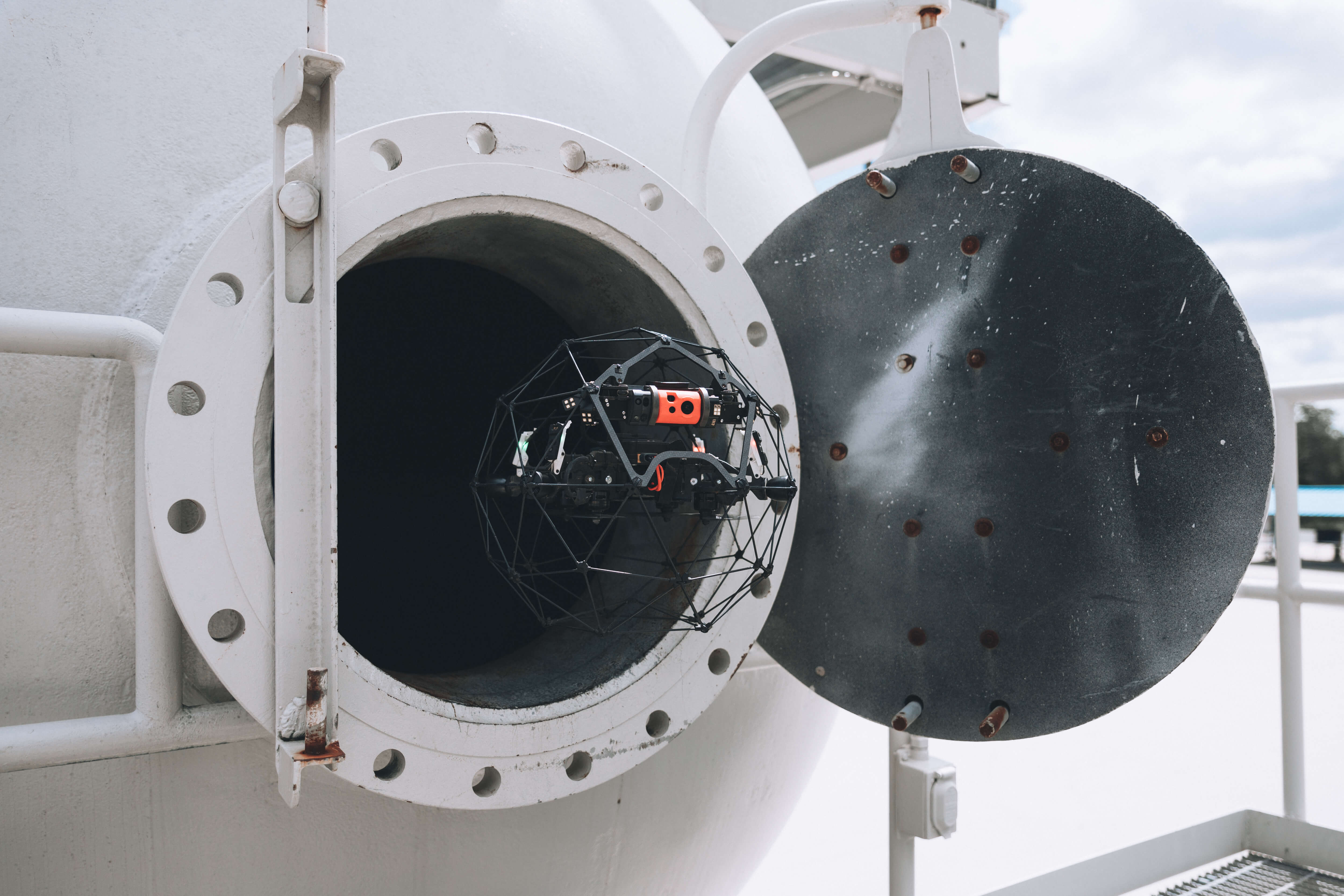 worker doing Confined Space Drone inspection